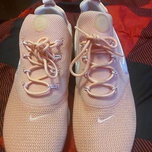 The pink nikey sneakers